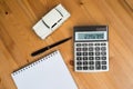 Calculator, a pen and a toy car Royalty Free Stock Photo