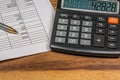 Calculator, pen, white finance paper Royalty Free Stock Photo