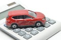 Calculator and red toy car Royalty Free Stock Photo