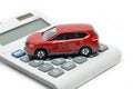 Calculator and red toy car Royalty Free Stock Photo