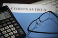 Calculator, Spectacles, File, Keyboard on the Table Royalty Free Stock Photo