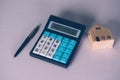 Calculator with text refinance home while expense for loan mortgage, investment and banking, property and cost.