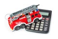 Calculator and toy fire truck Royalty Free Stock Photo