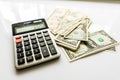 Close-up Money and Calculator, American Dollar Banknotes Royalty Free Stock Photo