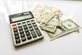 Close-up Money and Calculator, American Dollar Banknotes Royalty Free Stock Photo