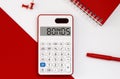 Calculator with the word BONDS on the display with red notepad and office tools