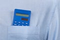 Calculator in your shirt pocket. Close up. Vintage pocket calculator Royalty Free Stock Photo