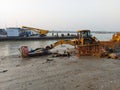 Solid waste product management removing structures from the holy Ganges after immersion of idol Maa kali to make pollution free . Royalty Free Stock Photo