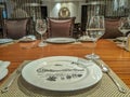 View of a luxurious dining table setup at a restaurant with silver spoon, fine