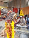 A domru ,trishul, worship by a indian sadhu smeared whole body with holy ash