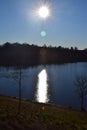 caldera lake Totenmaar with he silver street sun reflection in winter