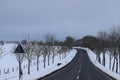 Daun, Germany - 01 06 2021: rural avenue in snowy Eifel winter