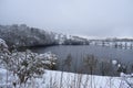 Daun, Germany - 01 06 2021: Weinfelder Maar in winter, thin ice and snow around