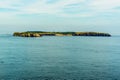 Caldey Island viewed from Lydstep Cavens, Wales showing Sandtop Bay Royalty Free Stock Photo