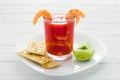 Caldo de camaron, consome de camarones, Shrimp cocktail with lemon and salted cookies mexican sea food in mexico Royalty Free Stock Photo