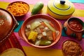 Caldo de res Mexican beef broth in table