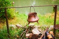 Caldron hanging above the fire