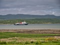 A Caledonian Macbrayne Cal Mac car ferry on West Loch Tarbert, off Corran Point on the Kintyre Peninsula in Argyll, Scotland, UK Royalty Free Stock Photo