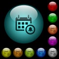 Calendar alarm icons in color illuminated glass buttons