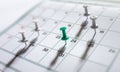 Calendar appointment thumbtacks in various dates on calendar diary Royalty Free Stock Photo