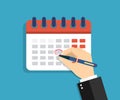 Calendar with circled date, appointment. Arm marks holiday in Calendar on the wall. Schedule of events on day, week, month and