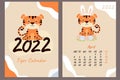 Calendar and cover for April 2022. Cute Easter tiger cub with bunny ears and Easter eggs. Year of the Tiger in Chinese or oriental