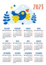 Calendar for 2023 with cute decorative yellow-blue bird dove with heart. Vector illustration. Vertical template for 12