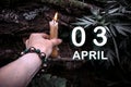 calendar date on the background of an esoteric spiritual ritual. April 3 is the third day of the month