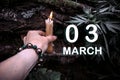 calendar date on the background of an esoteric spiritual ritual. March 3 is the third day of the month