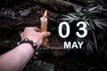 calendar date on the background of an esoteric spiritual ritual. May 3 is the third day of the month
