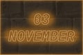 Calendar date on the background of an old brick wall. 3 november written glowing font. The concept of an important date or