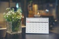 Calendar desk placed on business table. Desktop Calender for Planner to plan agenda, timetable, appointment, organization,
