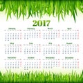 Calendar for 2017 with fresh green grass background vector Royalty Free Stock Photo