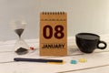 Calendar on January with the date 08th, 08 number on wooden, shape wood
