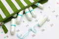 Calendar and menstruation sanitary soft cotton tampons. Woman critical days, gynecological menstrual cycle. Stripe beautician with