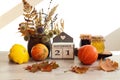 Calendar for November 21 : the name of the month in English, the number 21 , a bouquet of dried flowers in a basket, pumpkins, Royalty Free Stock Photo