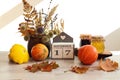 Calendar for November 17 : the name of the month in English, the number 17 , a bouquet of dried flowers in a basket, pumpkins, Royalty Free Stock Photo