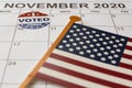 Calendar with November 3rd market with I voted today sticker and USA flag. US election day concept Royalty Free Stock Photo