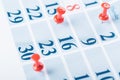 Calendar page for 2021, Concept image of a calendar with red push pins Royalty Free Stock Photo