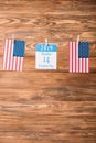 Calendar paper sheet with 14 October date between American national flags