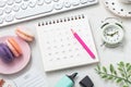 Calendar with pink pencil and clock on office table Royalty Free Stock Photo