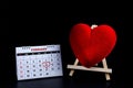 Calendar with red hand written heart highlight on February 14 of Saint Valentines day