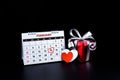 Calendar with red hand written heart highlight on February 14 of Saint Valentines day