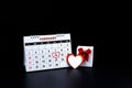 Calendar with red hand written heart highlight on February 14 of Saint Valentines day