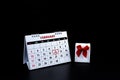 Calendar with red hand written heart highlight on February 14 of Saint Valentines day