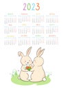 Calendar 2023 in Russian rabbit organizer couple bunny give bouquet flowers symbol hare year