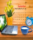 calendar September 2018, laptop, flowers and cup of milk Royalty Free Stock Photo