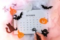 Calendar 31st of October date. Halloween background. Planning party. Flat lay. Top view. Halloween bat, pumpkin ghost decorations