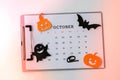 Calendar 31st of October date. Halloween background. Planning party. Flat lay. Top view. Halloween bat, pumpkin ghost decorations