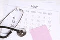 Calendar and stethoscope. Royalty Free Stock Photo